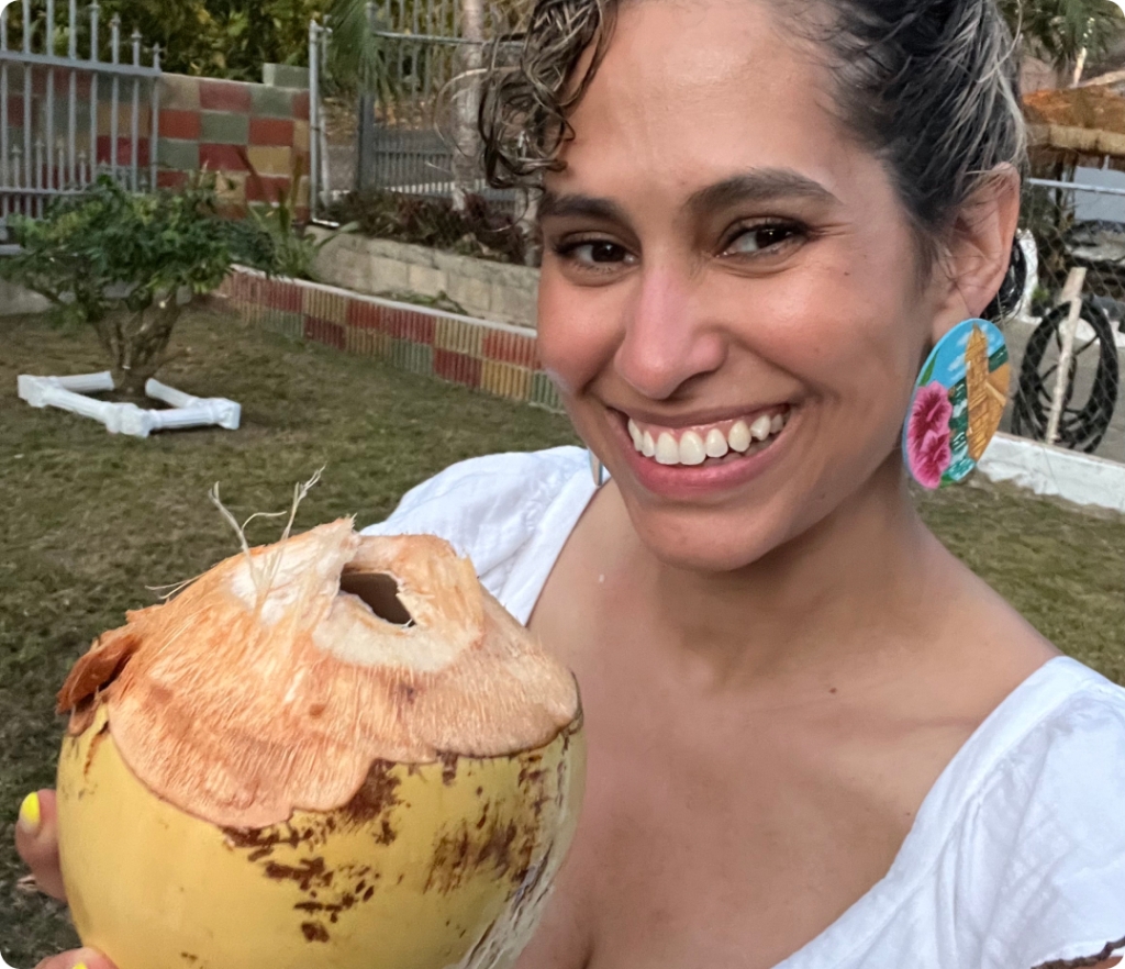 Rebeca Nieves with coconut smiling